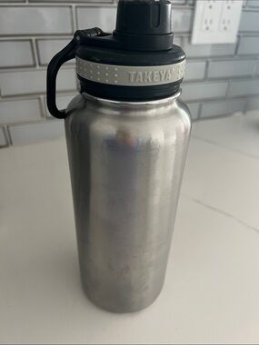 Takeya Stainless Steel Water Bottle with Grey Black Lid used only for water